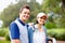 Golfing couple with an attractive smile. Portrait of golfing couple giving you an attractive smile.