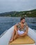 Golfo di Orosei Sardina, Men on the beach chilling in speed boat Sardinia Italy, young guy on vacation Sardinia Italy