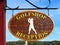 Golfshop reception sign close up