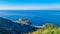 Goli Vrh - Panoramic aerial view on old historical town on the island of Sveti Stefan along the Budva coastline, Montenegro