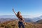 Goli Vrh - Woman on top of Goli Vrh with scenic aerial view on Dinaric Alps surrounding Lake Skadar National Park, Montenegro