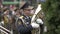 Gomel, Belarus - 05/09/2019: Male military musician plays the trumpet during festive parade