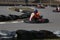 GOMEL, BELARUS - MARCH 8, 2010: Amateur competitions in races on karting track. organized recreation.