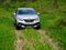 GOMEL, BELARUS - MAY 16, 2021: Renault silver car in the green forest