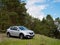 GOMEL, BELARUS - MAY 16, 2021: Renault silver car in the green forest