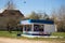 GOMEL, BELARUS - May 3, 2017: A small village shop stalls with a bicycle parked next to it