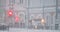 Gomel, Belarus. Special Machine Sprinkles Salt And Chemical Reagents At Sovetskaya Street In Winter Snowy Snowstorm Day