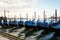 Gondola boats in Grand Canal in Venice, nobody in Italy