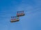 Gondola bubbles against the blue sky. Cable car taking tourists to Fort de La Bastille in Grenoble, France.