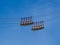 Gondola bubbles against the blue sky. Cable car taking tourists to Fort de La Bastille in Grenoble, France.