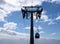 gondola on the cable car system linking funchal and monte in madeira passing a support pylon agains a blue cloudy sky