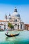 Gondola on Canal Grande with Basilica di Santa Maria della Salute, Venice, Italy