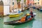 Gondola on canal in rainy day, Venice, Italy