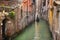 Gondola in a canal, Venice, Italy