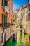 Gondola on canal in Venice, Italy