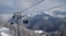 Gondola lift against mountain range