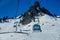 Gondola lift going up at the Snowbasin Ski Resort.