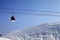 Gondola lift and off-piste slope at sun morning