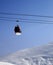 Gondola lift and off piste slope at sun morning