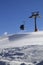 Gondola lift on ski resort at windy sun day