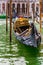 Gondola in picturesque canal in Venice Italy