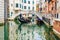 Gondola on the picturesque canals of Venice.