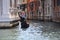 Gondola ride in Venice , Italy