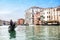 Gondola sailing in italian water canal