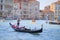 Gondola sails down the channel in Venice