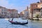 gondola sails down the channel in Venice