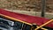 Gondola sliding on the water surface of the Venetian canal in Venice, Veneto, Italy. Venice is a city in northeastern