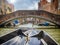 Gondola tour in a canal of Venice