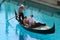 Gondola with tourists in a canal, Venetian Resort hotel and casino, Las Vegas, Nevada