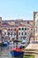 Gondola at Venice scenic old streets. Italian Lagoon