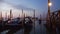 Gondolas in the bay of San Marco in the early morning. Venice, Italy