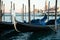 Gondolas berthed on the Venetian lagoon