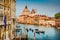 Gondolas on Canal Grande with Santa Maria della Salute at sunset