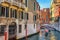 Gondolas on Canal Rio de San Zulian in Venice. Italy