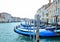 Gondolas floating on the Grand Canal on a quiet day of spring, Venice, Italy