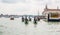 Gondolas and gondoliers in Venice, Italy.