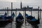 Gondolas moored on the canal