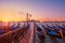 Gondolas moored to the poles in Europe Venice near the city center