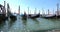 Gondolas moored in Venice in Italy