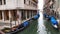 Gondolas parked on the canal of Venezia in the eatly morning