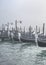 Gondolas Parked at Shore, Venice, Italy