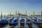 Gondolas pier row anchored on Canal Grande in Venice, Italy