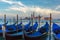 Gondolas at twilight in Venice lagoon, Italia