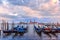 Gondolas at twilight in Venice lagoon, Italia