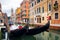 Gondolas in Venice canal. Venetian traditional gondola. Venezia cityscape, Italy