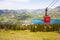 Gondolas of Zwoelferhorn Seilbahn cable way and a view of alpine landscape, Austria